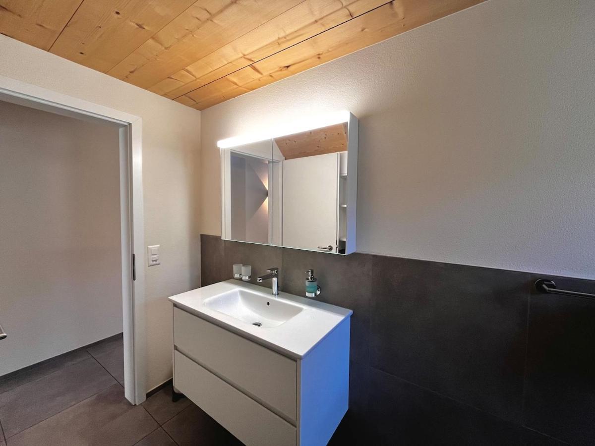 Beim Brunnen Apartment Gsteigwiler Bagian luar foto